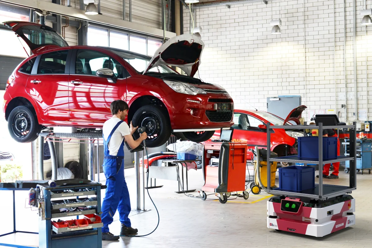 Gessbot with a shelf in an auto repair shop